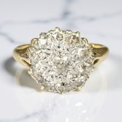 An antique 18ct gold diamond cluster ring, size Q CONDITION REPORT: 4.