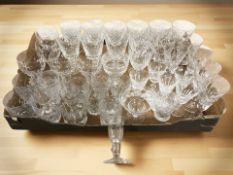 Assorted crystal drinking glasses.