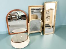 Three gilt framed mirrors, a wooden framed mirror and a circular frameless mirror, tallest 96 cm.