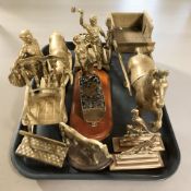 A group of brass figures and groups including horse and cart, farmer, miner,