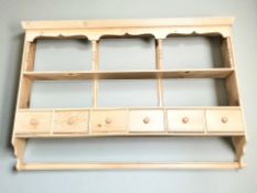 A contemporary pine farmhouse plate rack,