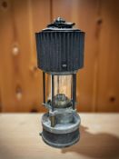 A 19th century Patterson Lamps Type HCP miner's safety lamp.