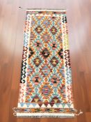 A Chobi Kilim runner,