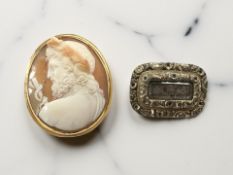An early 19th century mourning brooch backed in yellow gold,