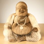 A carved wooden figure of Buddha, height 52 cm.