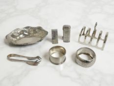 A George V silver five-bar toast rack, Atkinson Brothers Ltd, Birmingham 1933, length 7.