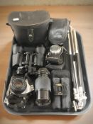 A pair of Prinz 8x40 binoculars, Optex 10x25 binoculars,