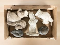 A group of composition garden animal ornaments.