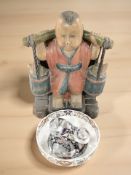 An oriental carved and painted figure of a boy carrying buckets containing tortoises, height 52 cm,