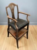 A Victorian child's mahogany carver armchair with detachable stand,