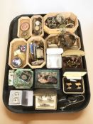 A collection of costume jewellery including various earrings and cufflinks, small gilt metal purse,