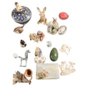 A group of painted egg ornaments, two pieces of coral, jade carving of an elephant,