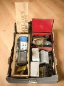 A group of vintage camping stoves.