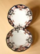 A pair of Royal Crown Derby Imari scalloped edge plates, pattern 3615,