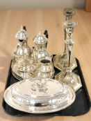 A pair of EPNS candlesticks, a small tea service on tray and a lidded entree dish.