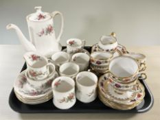 Nineteen pieces of Roslyn hand painted and gilt tea china,