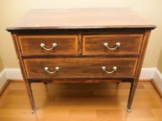 An Edwardian inlaid mahogany three drawer dressing chest, 92 cm x 50 cm x 81 cm.