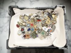 A group of vintage and later costume brooches