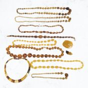 A group of bead necklaces all believed to be simulated amber, including celluloid,