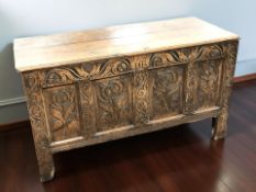 A George II carved oak coffer, dated 1731 and initialled 'IB', 130 cm x 57 cm x 73 cm.