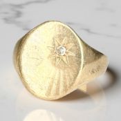 A 9ct gold signet ring with small diamond, shank split a/f CONDITION REPORT: 5.