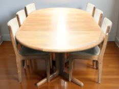 A G Plan teak oval extending dining table, with two leaves,