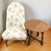A circular oak occasional table and a lady's chair