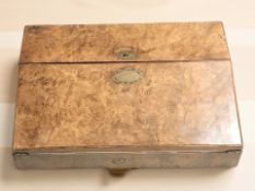 A Victorian figured walnut writing slope with inset makers plaque Parkins & Gotto,