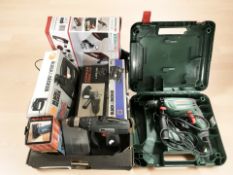 A group of mainly boxed power tools including Black & Decker, Bosch.