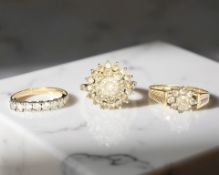 Three 9ct gold moissanite rings CONDITION REPORT: 5.