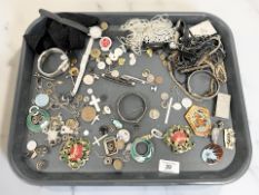 A tray of collectables, costume jewellery, buttons, enamel pendants, watches,