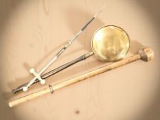 An ornamental sword, a brass bed warming pan and a large wooden beater.