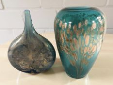 An Isle of Wight blue glass vase with gilt highlights, and a similar art glass vase, height 24 cm.