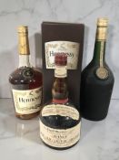 A bottle of Hennessy Very Special cognac, 40% vol, 1L, in carton, a bottle of Martel VSOP cognac,