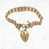 A 9ct gold padlock bracelet CONDITION REPORT: 16g