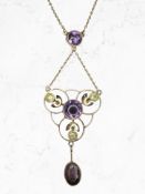 An early 20th century 9ct yellow gold amethyst and peridot pendant on chain, length 41.5 cm.