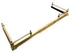 A Victorian brass telescopic fire curb.