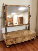 A 19th century mahogany bow front dressing table mirror, width 47 cm.