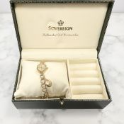 A lady's 9ct gold Sovereign wristwatch on 9ct gold integral bracelet,