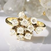A 9ct gold moissanite cluster ring, size P CONDITION REPORT: 2.