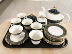 A twenty one piece Royal Doulton Carlyle tea set.