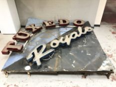 A very large sign 'Tuxedo Royale', in two sections, on metal back, overall 245 cm x 260 cm approx.
