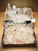 Assorted crystal drinking glasses, candle holders, decanters, vase.