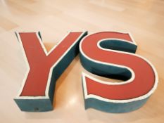 Two large enameled metal letters Y and S, each 51 cm high.