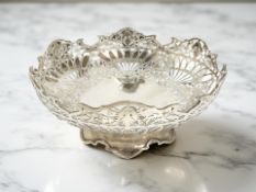 An Elizabeth II pierced silver bowl, Viners, Sheffield 1958, diameter 22cm.