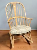 An Ercol elm and beech spindle back rocking chair
