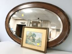 An Edwardian oval mahogany mirror, width 82 cm, together with a print.