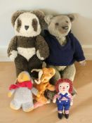 A vintage jointed mohair teddy bear and several further soft toys.