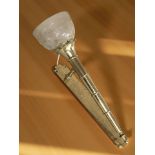 A brass and etched glass wall sconce, wired for electricity,