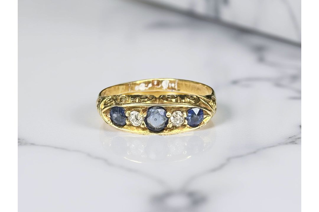 An antique 18ct gold sapphire and diamond ring, size O CONDITION REPORT: 2.
